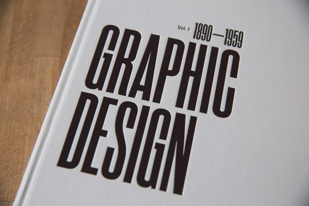 Close-up image of a graphic design book cover with bold text.