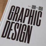Close-up image of a graphic design book cover with bold text.